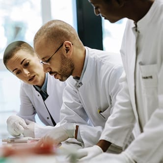 Medical doctors reviewing lab work.